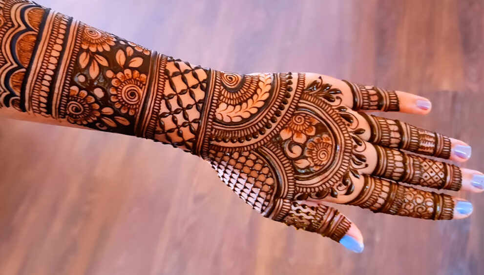 Beautiful woman dressed up as Indian tradition with henna mehndi design on  her both hands to celebrate big festival of Karwa Chauth, Karwa Chauth  celebrations by Indian woman for her husband 17096928