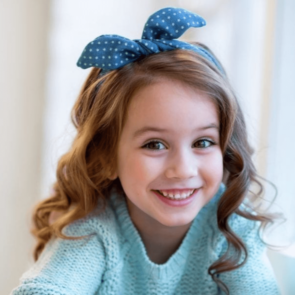 Side-Swept Curls Baby Girl Hairstyles