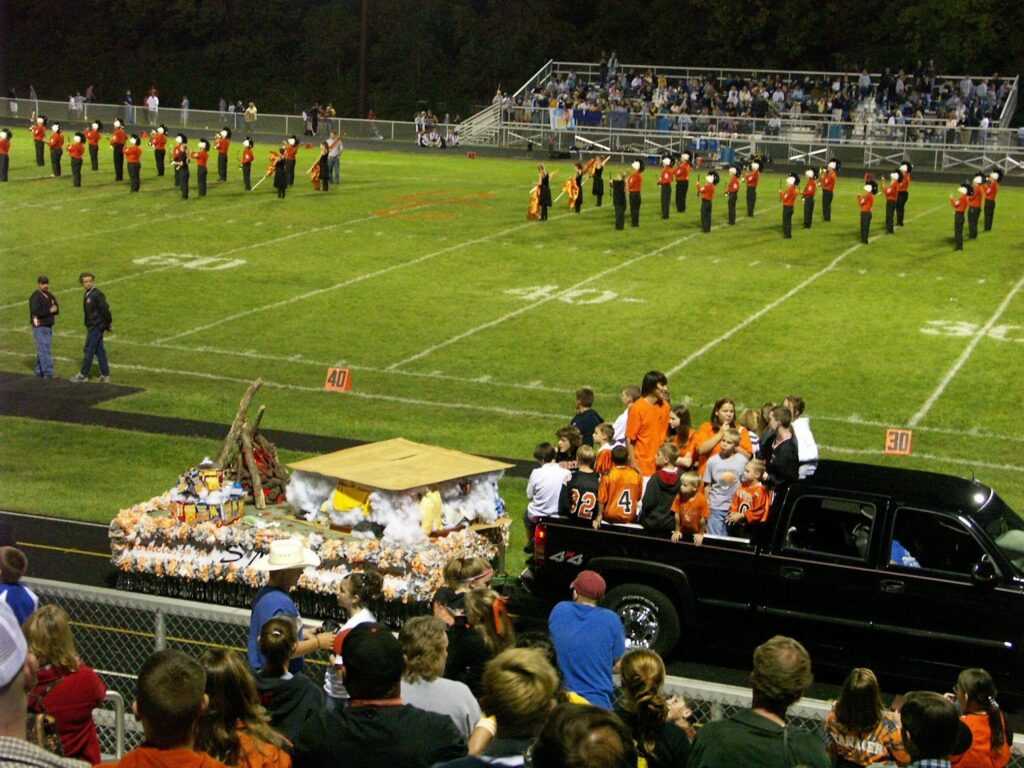 homecoming marching band in football stadium